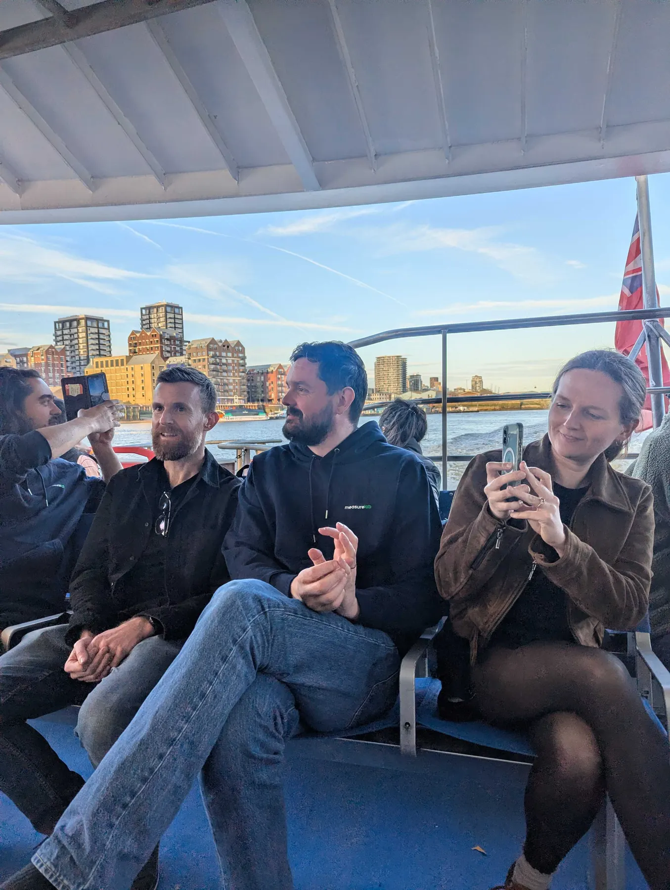 Colleagues on a Thames river boat during the London meet-up